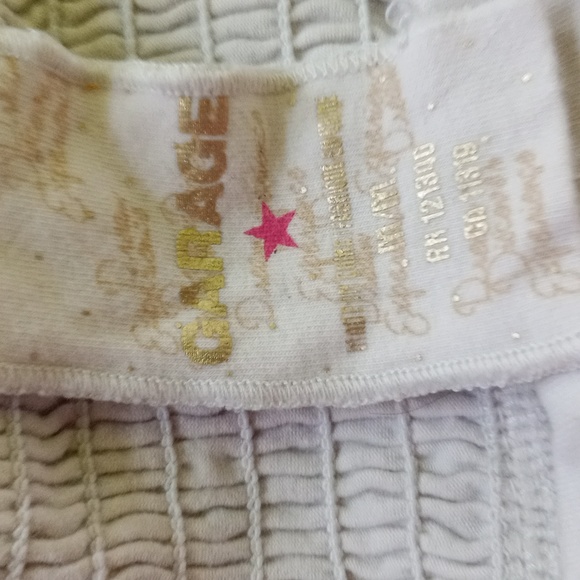 Strapless tee, garage brand tee. Super cute and comfy, flows over midsection. - Picture 2 of 3